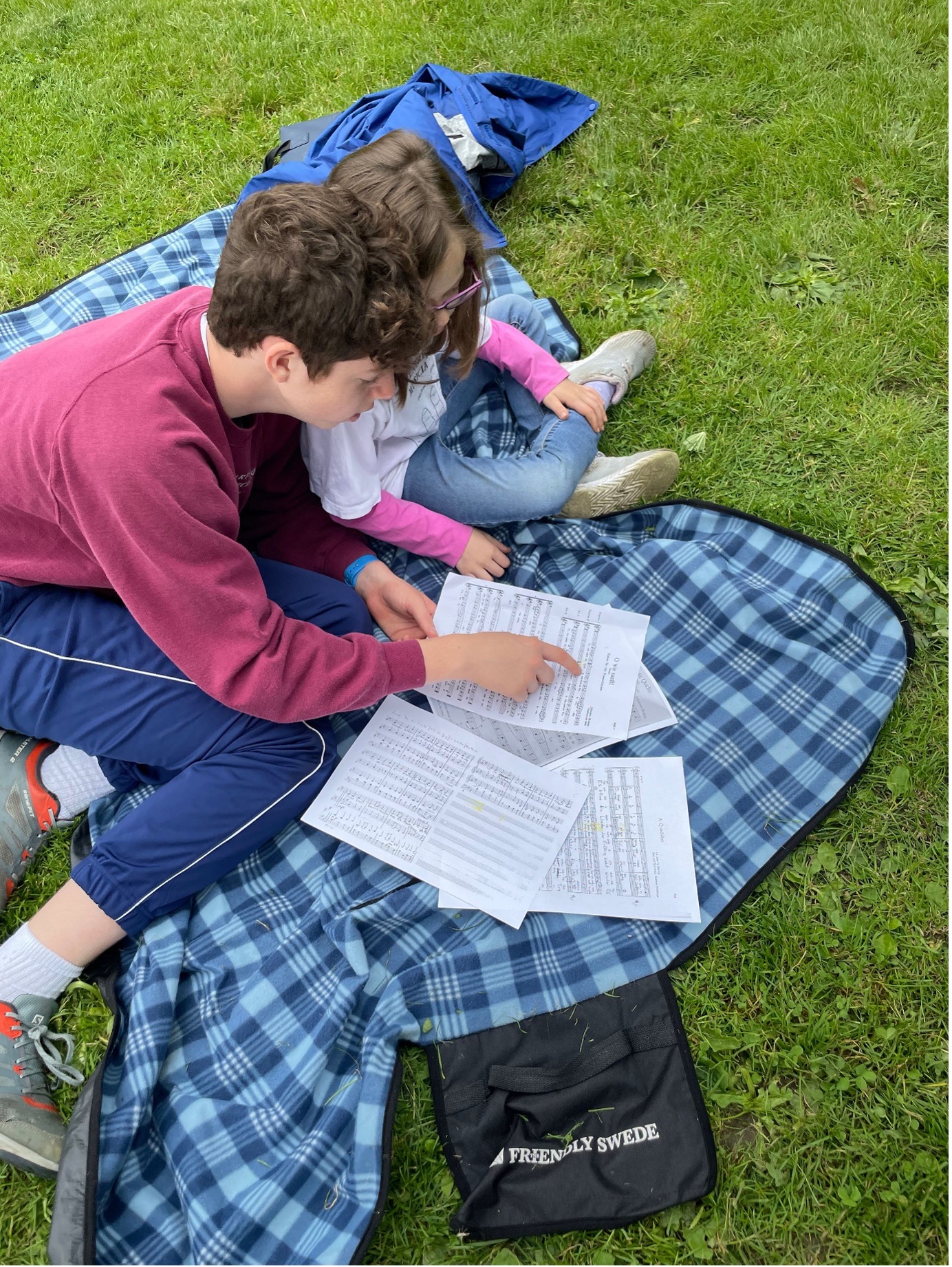 Adam guides sister Rebecca through Brahmss polyphonic lines.